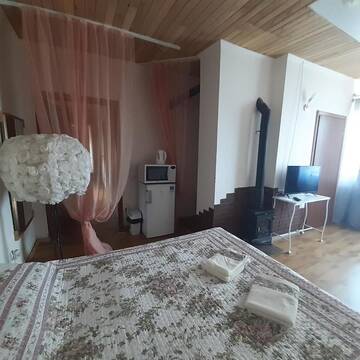 Фото номера Номер с кроватью размера &quot;king-size&quot; и видом на сад Гостевой дом Daiņa Mežanci Brivdienu māja г. Страупе 2